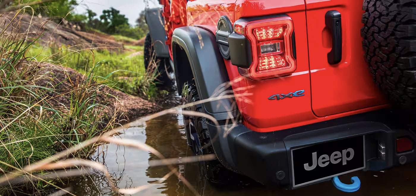Jeep Wrangler 4xe in muddy water